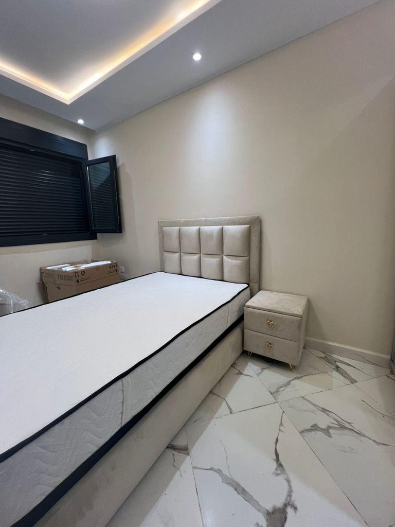 Capitonnage carré — beige